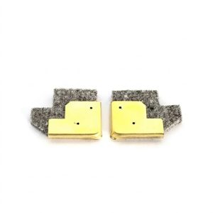 StopGap weatherstripping, a pair of gold L-shaped clips with gray felt pads