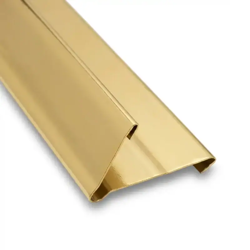 Length of polished brass V-Bronze weatherstrip with a folded V-shaped spring profile